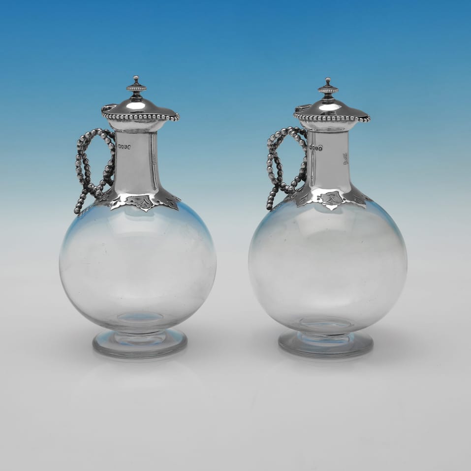 Antique Sterling Silver & Glass Pair of Claret Jugs - John Septimus Beresford, hallmarked in 1884 London - Victorian