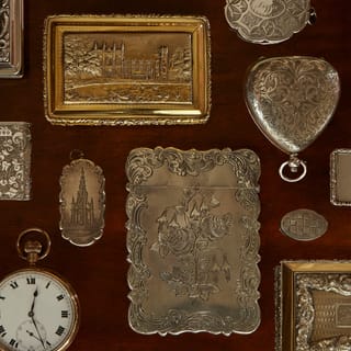 A group of sterling silver boxes and collectibles